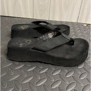 Black platform flip flops